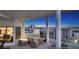 Expansive balcony offering stunning city and bay views with lounge seating and entertainment space at 111 S Pineapple Ave # 1210, Sarasota, FL 34236