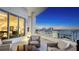 Condo balcony featuring an outdoor seating area and sunset views at 111 S Pineapple Ave # 1210, Sarasota, FL 34236