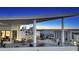 Spacious condo balcony with lounge furniture and cityscape view at 111 S Pineapple Ave # 1210, Sarasota, FL 34236