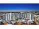 Luxury condominium building featuring a community pool, outdoor space, and prime location at 111 S Pineapple Ave # 1210, Sarasota, FL 34236