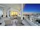 A spacious balcony with comfortable seating, perfect for relaxing and enjoying the city view at 111 S Pineapple Ave # 1210, Sarasota, FL 34236