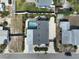 A lovely single-story home featuring a screened-in pool, backyard, and paved driveway at 1112 65Th Nw St, Bradenton, FL 34209