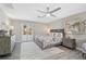 This bedroom has french doors that open to the backyard pool area at 1112 65Th Nw St, Bradenton, FL 34209