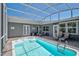 Beautiful screened in pool with lounge chairs for relaxing and enjoying the Florida sunshine at 1112 65Th Nw St, Bradenton, FL 34209