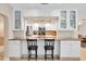 Modern kitchen featuring updated countertops, white cabinets, and stainless steel appliances at 1130 Mill Creek Rd, Bradenton, FL 34212