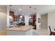 Well-equipped kitchen featuring granite countertops and stainless steel appliances at 116 Navigation Cir # 106, Osprey, FL 34229