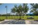 Central Park community with open field, shade trees, and blue picnic pavilion at 12133 Forest Park Cir, Bradenton, FL 34211