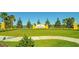 Welcoming Central Park entrance sign, complemented by lush landscaping and picturesque water view at 12133 Forest Park Cir, Bradenton, FL 34211