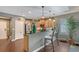 Stylish kitchen featuring modern stainless steel appliances, granite countertops, and bar seating at 12133 Forest Park Cir, Bradenton, FL 34211