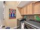 The laundry room offers cabinetry for storage, providing a practical space for laundry tasks at 12133 Forest Park Cir, Bradenton, FL 34211