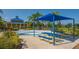 Park featuring a splash pad, picnic tables, and sheltered picnic pavilion at 12133 Forest Park Cir, Bradenton, FL 34211