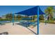 Covered picnic tables provide a relaxing space next to community tennis courts at 12133 Forest Park Cir, Bradenton, FL 34211