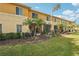 Exterior backyard showcasing well-maintained lawn and lush landscaping at 12358 Destiny Dr, Venice, FL 34292