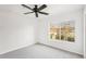 Bedroom with a large window offering natural light and views of the outdoors at 12358 Destiny Dr, Venice, FL 34292