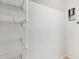 A closet with metal shelving provides functional storage and organization at 12358 Destiny Dr, Venice, FL 34292
