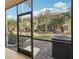 Screened patio with view of community lawn and landscaping at 12358 Destiny Dr, Venice, FL 34292