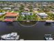 Aerial view highlighting the location of the canal front home in a established neighborhood at 127 Colonial Sw St, Port Charlotte, FL 33952