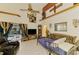 Comfortable living room with a view of the pool, complete with tile floors and natural light at 127 Colonial Sw St, Port Charlotte, FL 33952