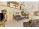 Inviting living room with high ceilings, tile floors, and unique decor at 127 Colonial Sw St, Port Charlotte, FL 33952