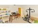 Bright home office space featuring a wood desk, shelves, and exercise equipment at 127 Colonial Sw St, Port Charlotte, FL 33952