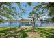 Peaceful waterfront view with the boat lift ready for your boat in the beautiful channel at 127 Colonial Sw St, Port Charlotte, FL 33952