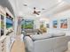 Comfortable living room with sliding glass doors leading to the outdoor area at 1313 Thornapple Dr, Osprey, FL 34229