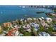 An aerial view showing the proximity of the home to the ocean and the surrounding neighborhood at 1365 Harbor Dr, Sarasota, FL 34239