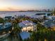 This contemporary home has waterfront views, pool, and is in a premium neighborhood at 1365 Harbor Dr, Sarasota, FL 34239
