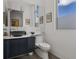 Contemporary bathroom with a unique stone sink and modern fixtures at 1365 Harbor Dr, Sarasota, FL 34239