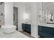 Modern bathroom includes double sinks, vanity, and marble countertop at 1365 Harbor Dr, Sarasota, FL 34239