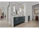 Modern bathroom includes double sinks, vanity, and marble countertop at 1365 Harbor Dr, Sarasota, FL 34239