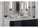 Modern bathroom featuring a sleek vessel sink, marble countertop, and stylish lighting fixtures at 1365 Harbor Dr, Sarasota, FL 34239