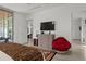 Bedroom featuring a modern television on a grey dresser at 1365 Harbor Dr, Sarasota, FL 34239