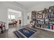 Spacious bedroom with an adjoining bedroom or sitting room and ample bookshelf space at 1365 Harbor Dr, Sarasota, FL 34239