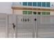 Close-up of the address on the modern gate adding curb appeal to the home at 1365 Harbor Dr, Sarasota, FL 34239
