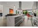 Open kitchen with modern cabinetry, a large island and stainless steel appliances at 1365 Harbor Dr, Sarasota, FL 34239