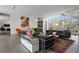 An expansive living area with statement art, modern decor, and an open layout perfect for entertaining at 1365 Harbor Dr, Sarasota, FL 34239