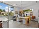 Bright and modern office space with large windows, custom desks, and comfortable seating at 1365 Harbor Dr, Sarasota, FL 34239