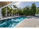 Beautiful pool area featuring a hammock and lush tropical greenery at 1365 Harbor Dr, Sarasota, FL 34239