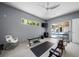 Spacious workout room with exercise equipment and sliding glass doors to the pool area at 1365 Harbor Dr, Sarasota, FL 34239