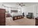 Serene bedroom featuring a king-size bed, ample closet space, and a cozy sitting area near the windows at 14363 59Th E Cir, Lakewood Ranch, FL 34211