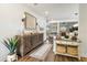 Inviting home foyer showcasing stylish console table, decor, and seamless transition to the living areas at 14363 59Th E Cir, Lakewood Ranch, FL 34211
