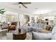 Bright living room with hardwood floors, neutral tones, and comfortable seating at 14363 59Th E Cir, Lakewood Ranch, FL 34211