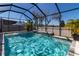 Covered patio with dining and lounging areas with views of the pool at 14363 59Th E Cir, Lakewood Ranch, FL 34211
