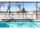 Sparkling pool with a water feature and screened enclosure at 14363 59Th E Cir, Lakewood Ranch, FL 34211
