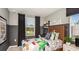 This bedroom is set up for a , with a work area next to the window at 15140 Cuzcorro Ct, Nokomis, FL 34275