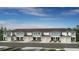 Charming townhome showcasing a welcoming facade and manicured landscaping at 15140 Cuzcorro Ct, Nokomis, FL 34275