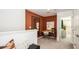 Loft area featuring a desk and shelves at 15140 Cuzcorro Ct, Nokomis, FL 34275