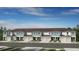 Charming townhome with a two-car garage, beautiful landscaping, and a well-maintained exterior at 15149 Cuzcorro Ct, Nokomis, FL 34275