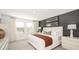 Stylishly decorated bedroom with a neutral color palette and lots of natural light at 15177 Cuzcorro Ct, Nokomis, FL 34275